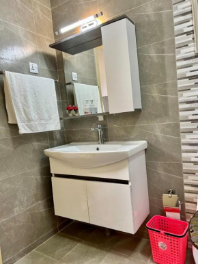 lovely fully furnished two bedroom apartment with heated swimming pool well equipped gym ample parking space children playing ground and a relaxing rooftop with amazing scenic views